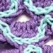 A close up of a scale on the purple scarf option.